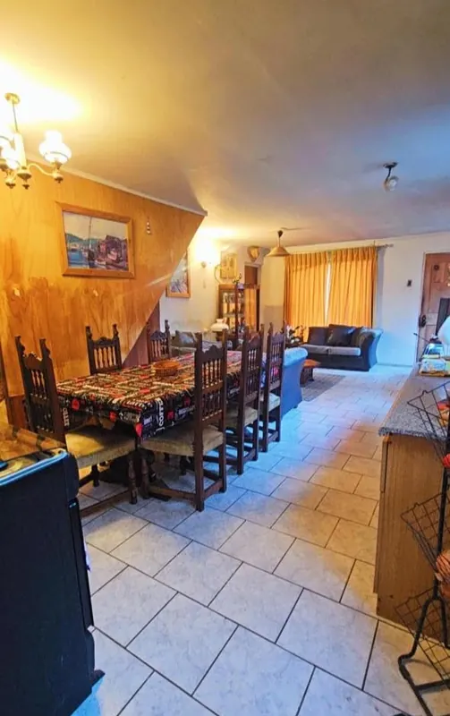 Espacio común y comedor de Garden House Senior Suites